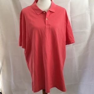 A salmon polo shirt